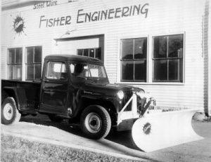 Fisher plow in front of the original Fisher location