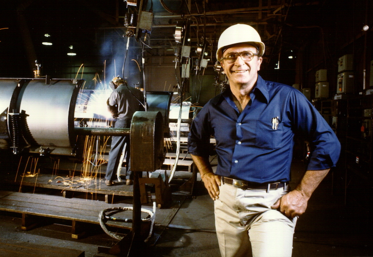 Man standing in manufacturing facility