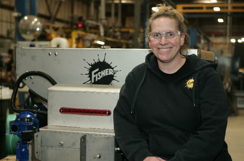 Woman in front of Fisher product