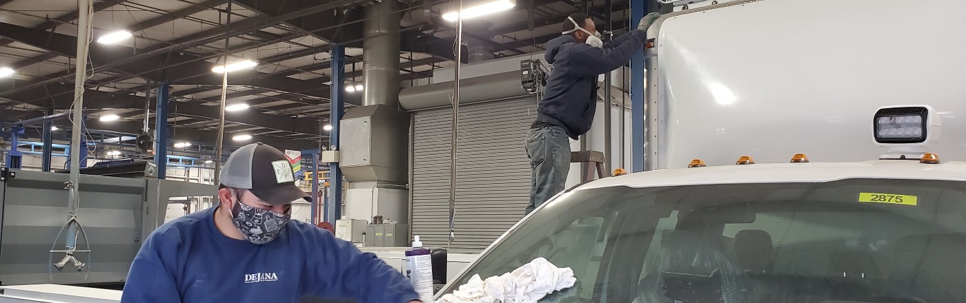 People working on a truck