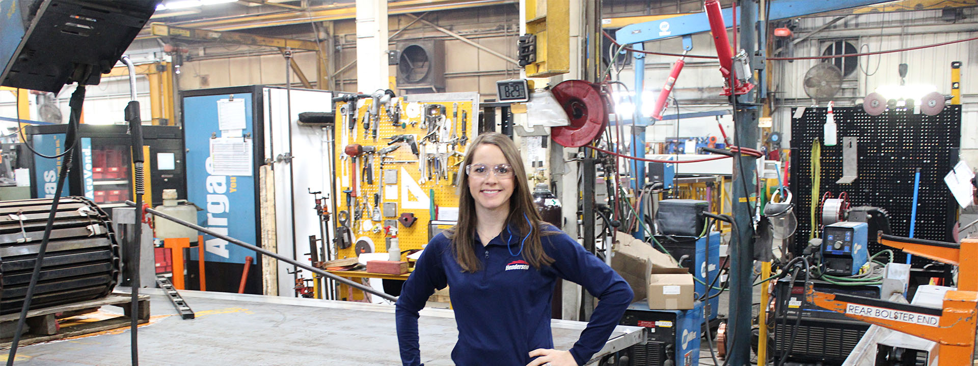 Woman in manufacturing facility